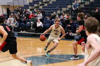 Sentinel Rob Canfield driving into the paint