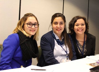 Patrick Henry College (PHC) student Julianne Owens works with National Model United Nations (NMUN) delegates from other colleges 