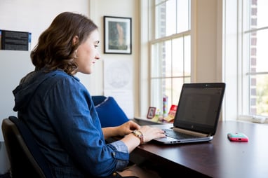 Patrick Henry COllege student studying in dorm