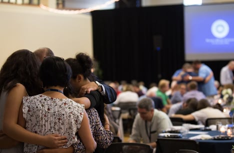 Families praying with their freshmen during New Student Orientation in 2017